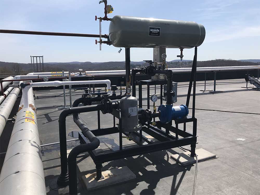 Refrigeration piping and tanks on roof