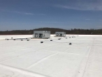 2 Refrigeration units on roof of warehouse