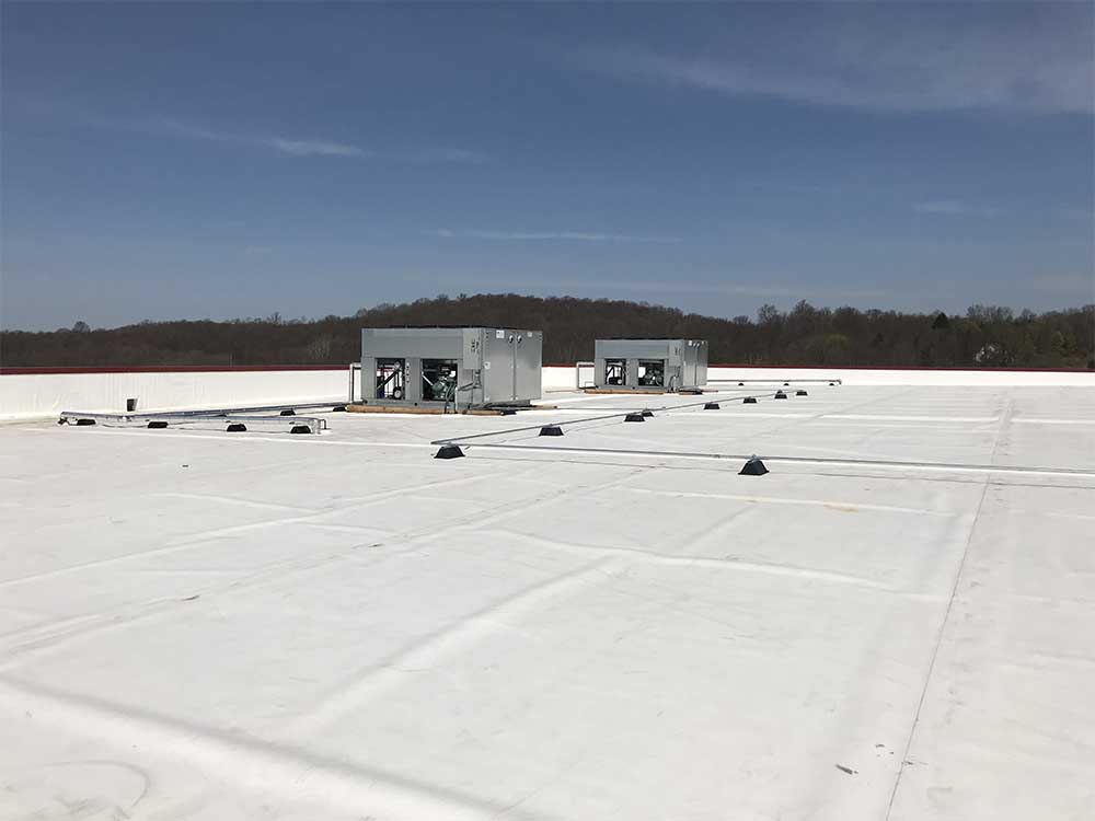 2 Refrigeration units on roof of warehouse