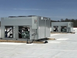 Close up of 2 Refrigeration units on roof of warehouse